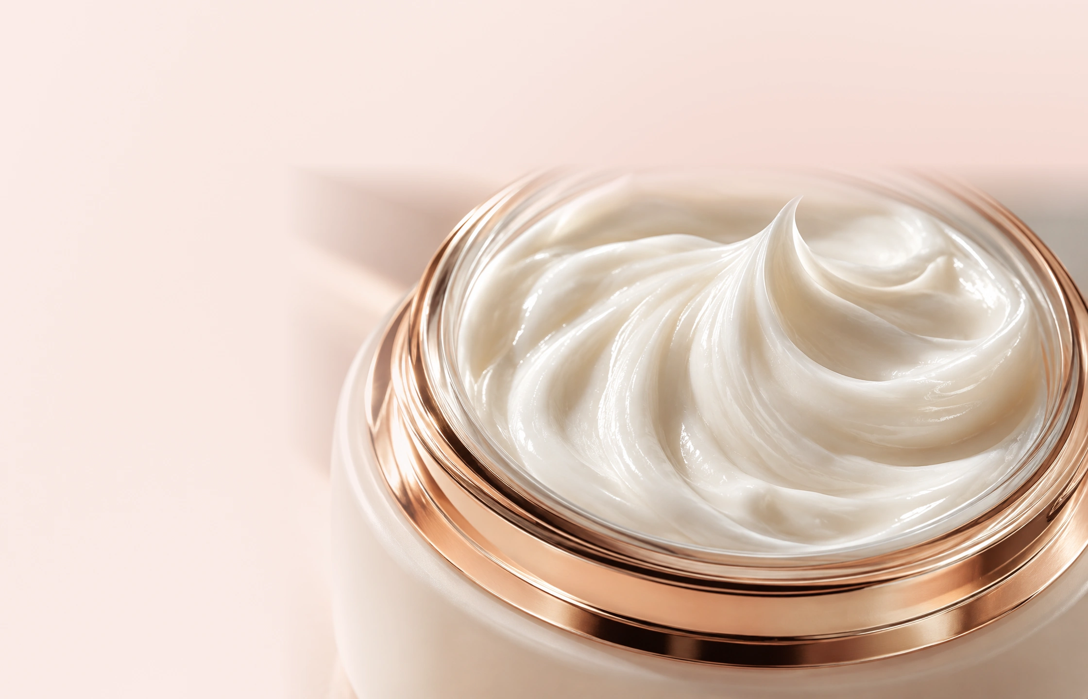 Topical cream in a rose-gold jar